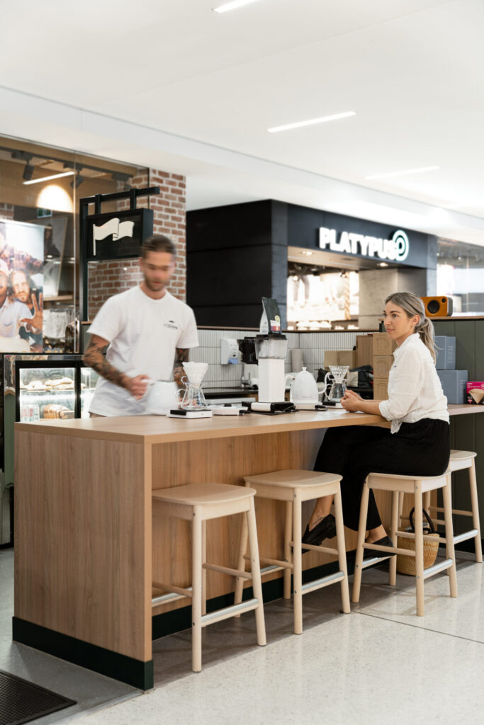 Tim Adams Specialty Coffee, the brainchild of award-winning Australian barista Tim Adams, approached the Total Fitouts Sunshine Coast South team to create their Flagship store within Kawana Shopping World. The talented team were tasked with creating a natural space that reflects the company’s sustainable ethos & ethically responsible products. Collectivus, a key collaborator in designing the project, helped achieve the retail fitout's overall aesthetic, layout, and finishes.

Tim, the owner of the certified fair-trade coffee brand, famous for his ‘Giving Back Chapola Project, wanted to create an earthy, grounded hospitality fit out within a bright, bustling shopping centre.