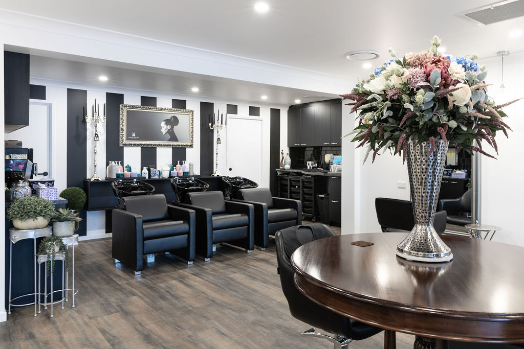 Black and white colour palette, funky design elements and welcoming reception area for this wellness & beauty fit out for Madame Me Mes