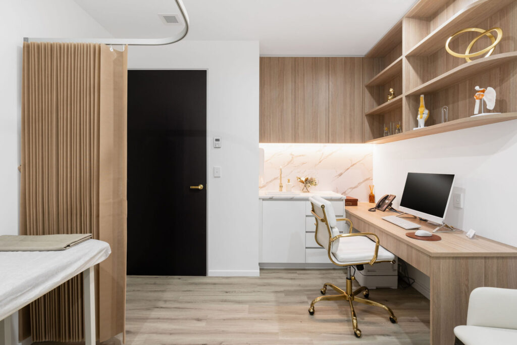 Neutral colour palette, hardwood floors and welcoming reception area for this medical fit out for Plaza Central