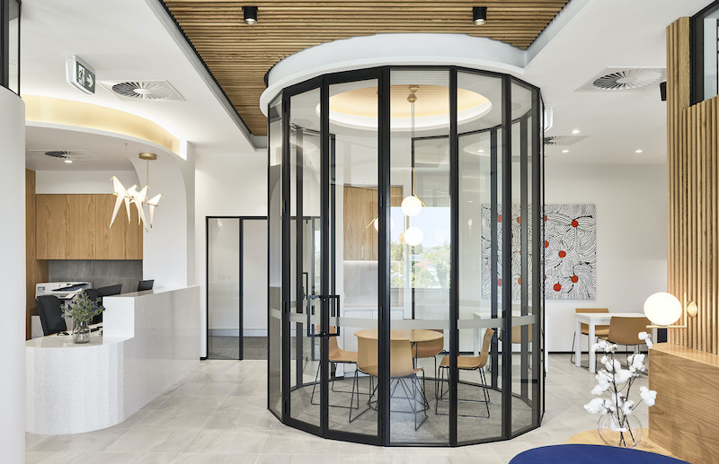 Neutral colour palette, custom wooden features and welcoming reception area for this medical fit out for the Orthopaedic Clinic