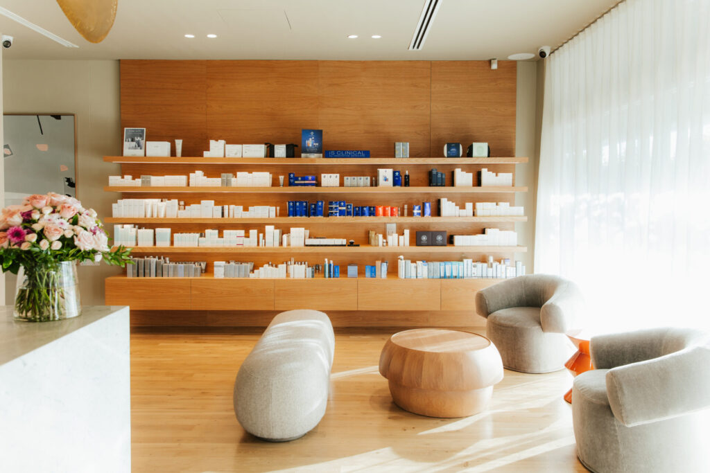 Floor to ceiling windows, hardwood floors and welcoming reception area for this wellness fit out for A Touch of Beauty