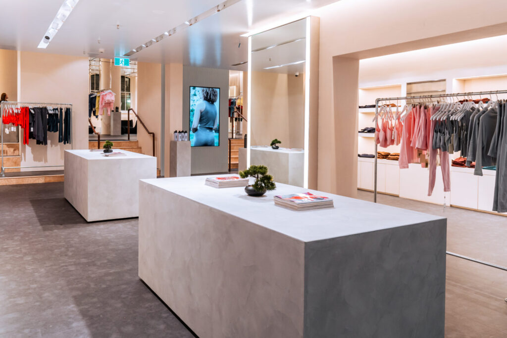 Custom LED lighting, bespoke merchandise displays and neutral colour palette for this retail fit out for Stax