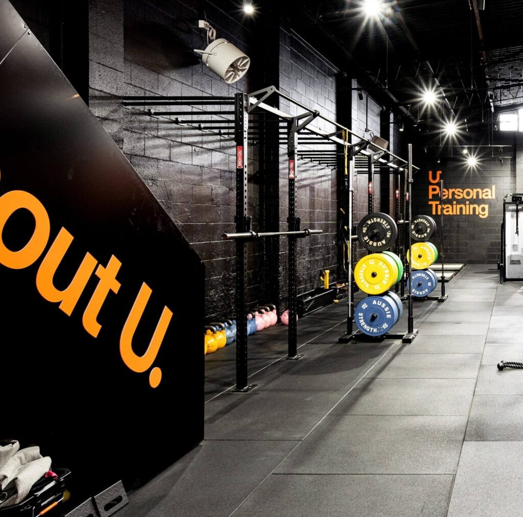 Industrial black brick walls and styling, black functional equipment and ample lighting for this fitness fit out for U Personal Training